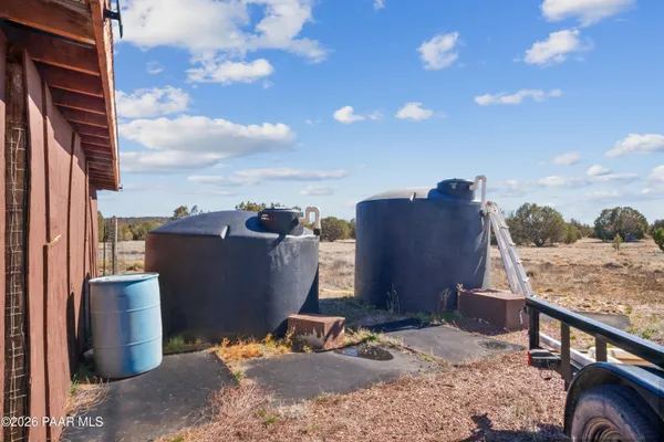 a view of a backyard with a fireplace