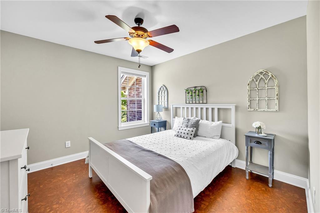 6410 Ashton Park Drive Oak Ridge, NC 27310 - Photo 27 of 49 Bedroom with cork flooring.