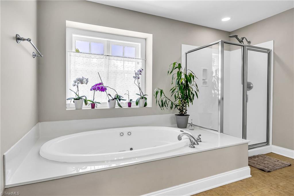 6410 Ashton Park Drive Oak Ridge, NC 27310 - Photo 34 of 49 Primary bathroom.