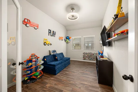 a living room with furniture and a couch