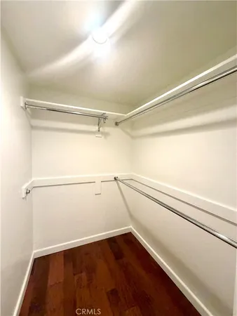 a view of an empty walk in closet