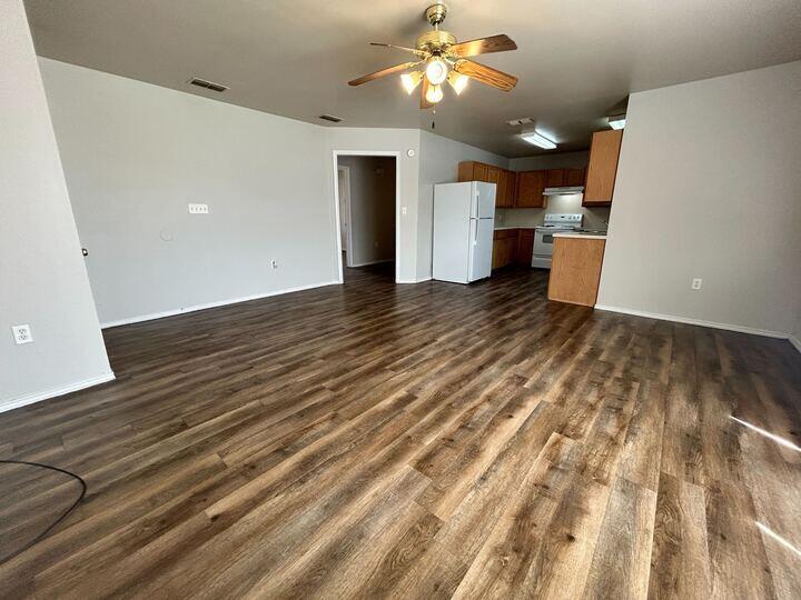 1116 82nd Street, Unit B Lubbock, TX 79423 - Photo 3 of 13 a view of a livingroom with a fireplace
