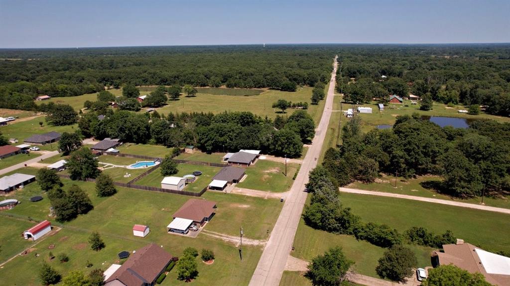 1974 County Road Powderly, TX 75473 - Photo 28 of 28 an aerial view of residential houses with outdoor space