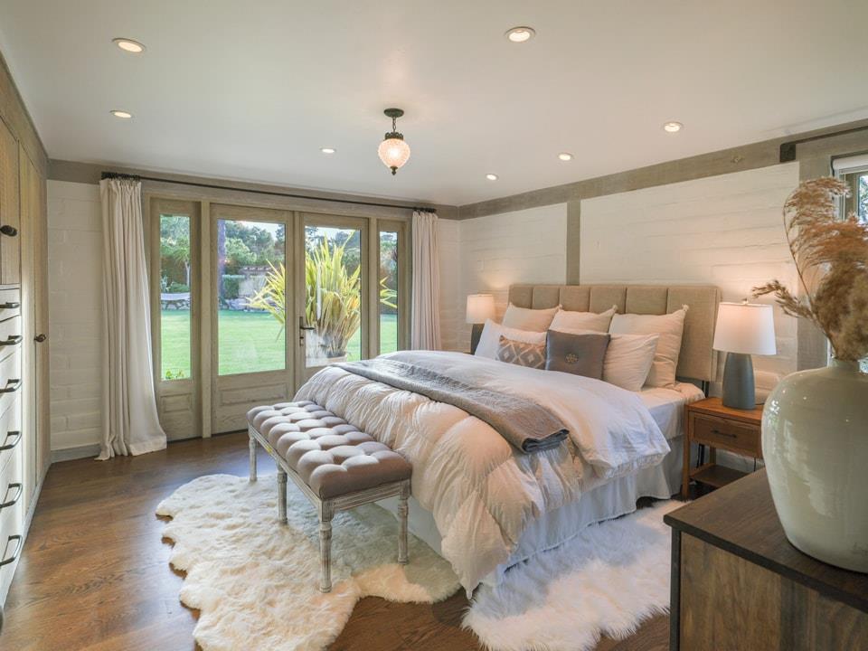 1340 Jacks Road Monterey, CA 93940 - Photo 17 of 37 a spacious bedroom with a bed and a large window