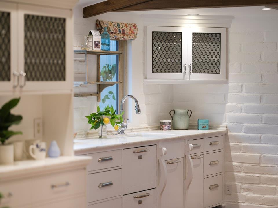 1340 Jacks Road Monterey, CA 93940 - Photo 6 of 37 a kitchen with stainless steel appliances white cabinets and a window