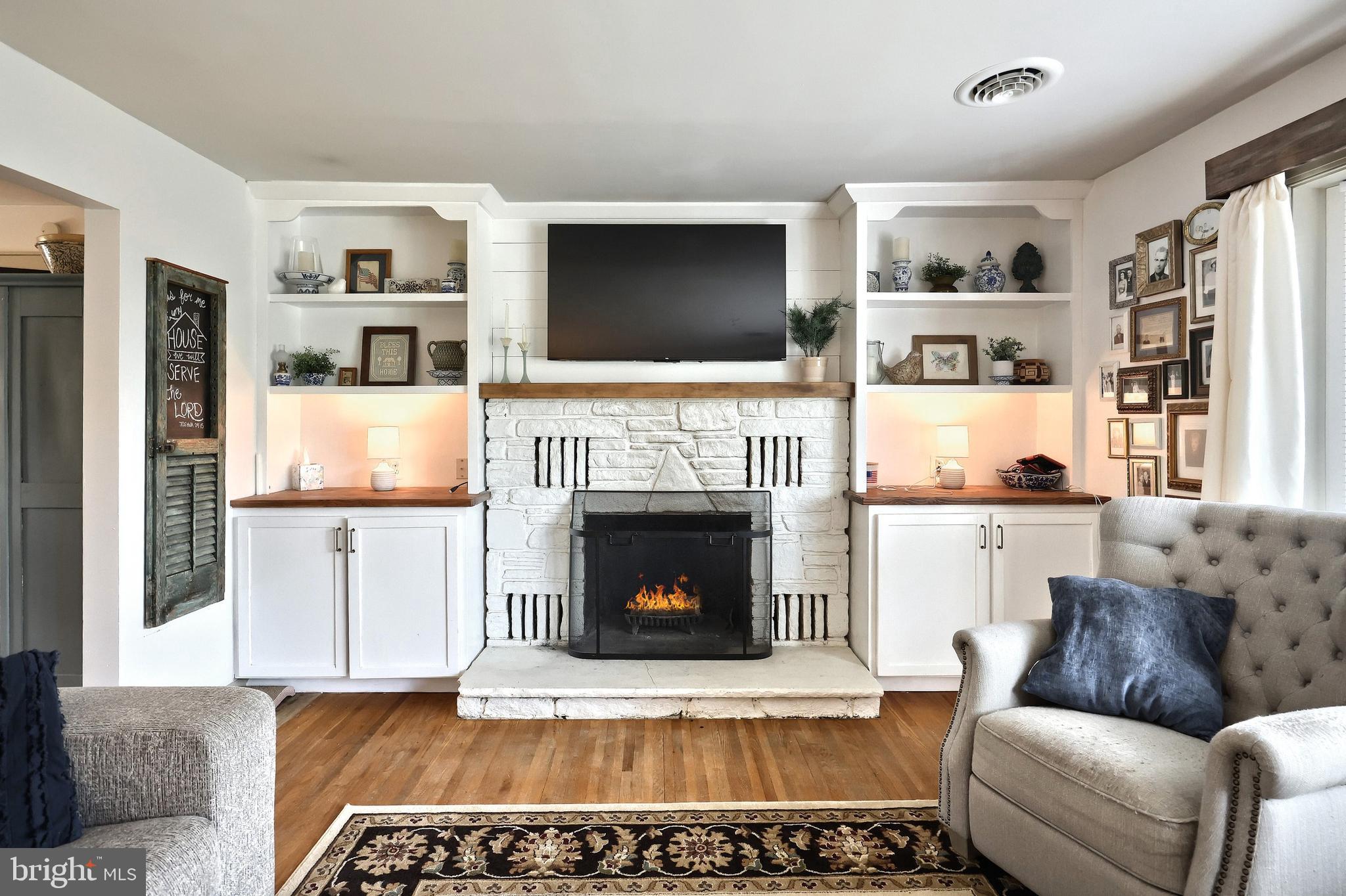 492 Bollinger Road Littlestown, PA 17340 - Photo 11 of 47 a living room with furniture and a fireplace