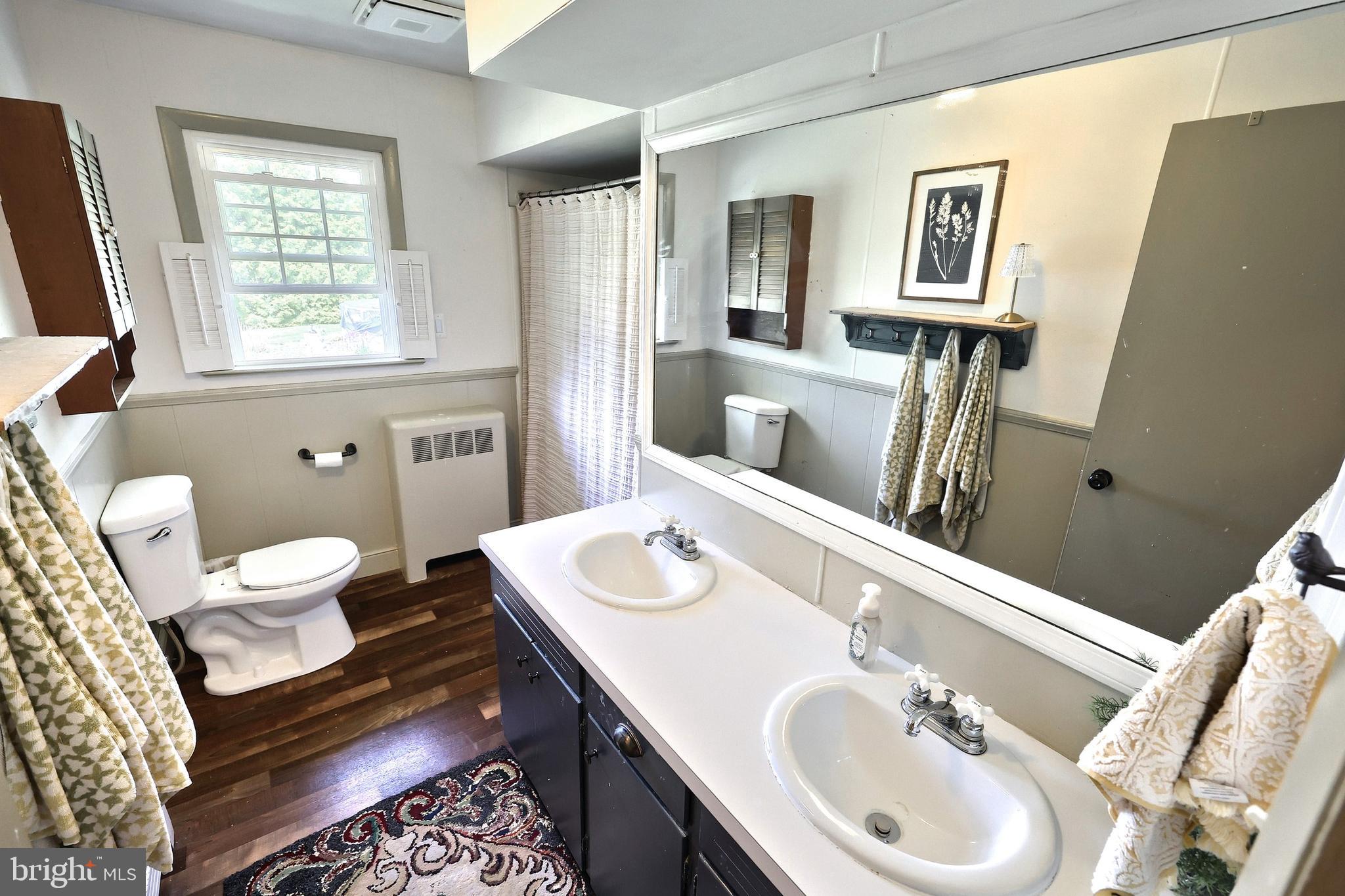 492 Bollinger Road Littlestown, PA 17340 - Photo 20 of 47 a bathroom with a sink and a mirror