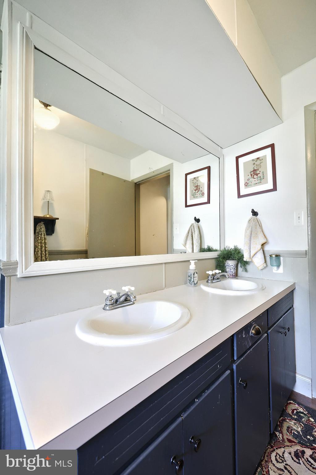 492 Bollinger Road Littlestown, PA 17340 - Photo 21 of 47 a bathroom with a sink and a mirror