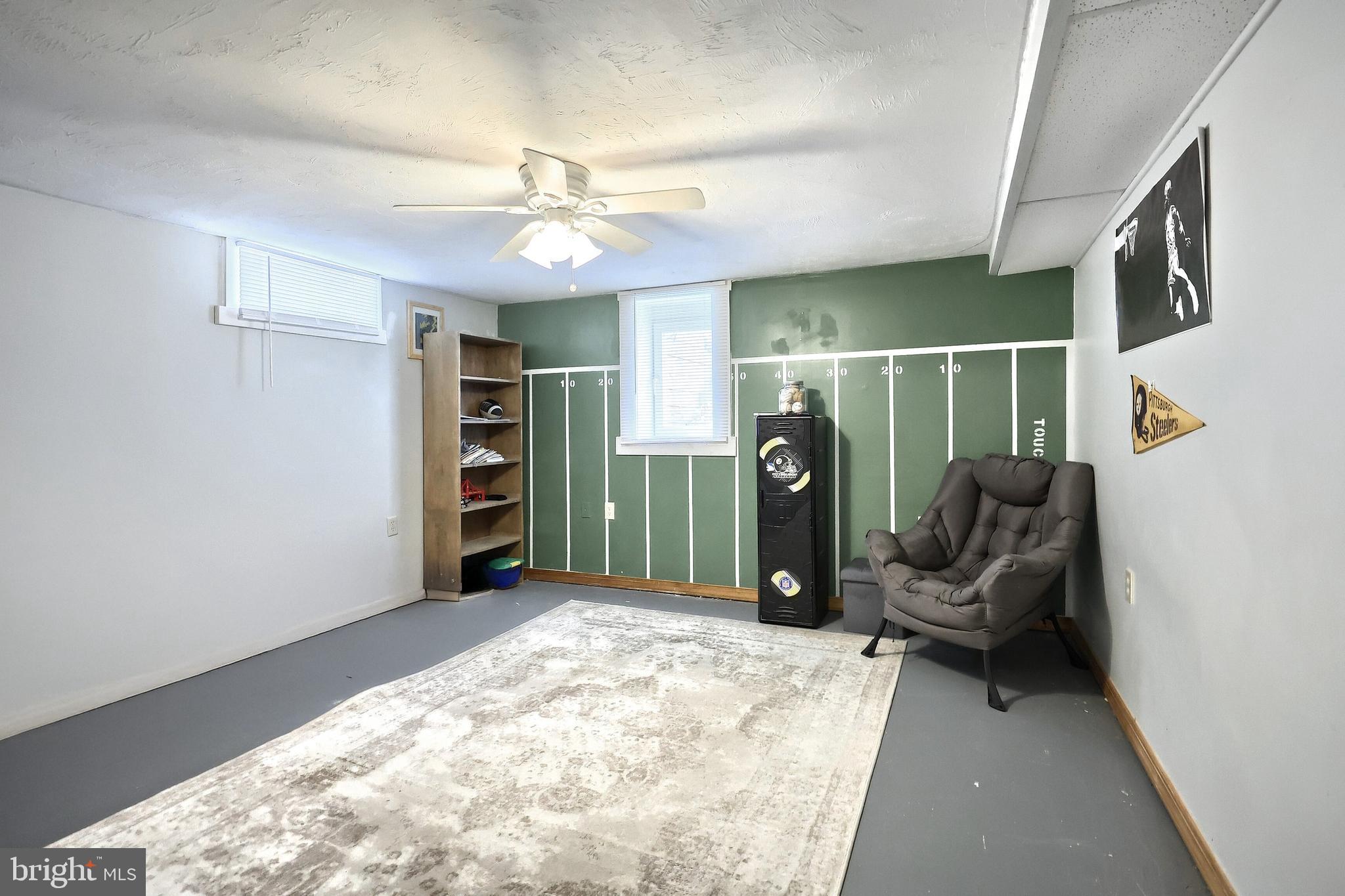492 Bollinger Road Littlestown, PA 17340 - Photo 33 of 47 a view of a livingroom with furniture and a ceiling fan