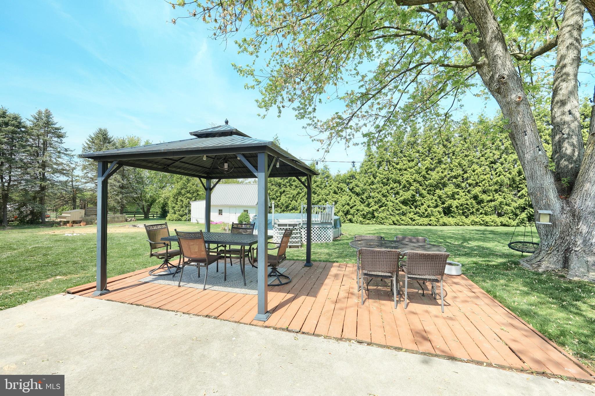 492 Bollinger Road Littlestown, PA 17340 - Photo 35 of 47 a view of backyard with barbeque grill and outdoor seating