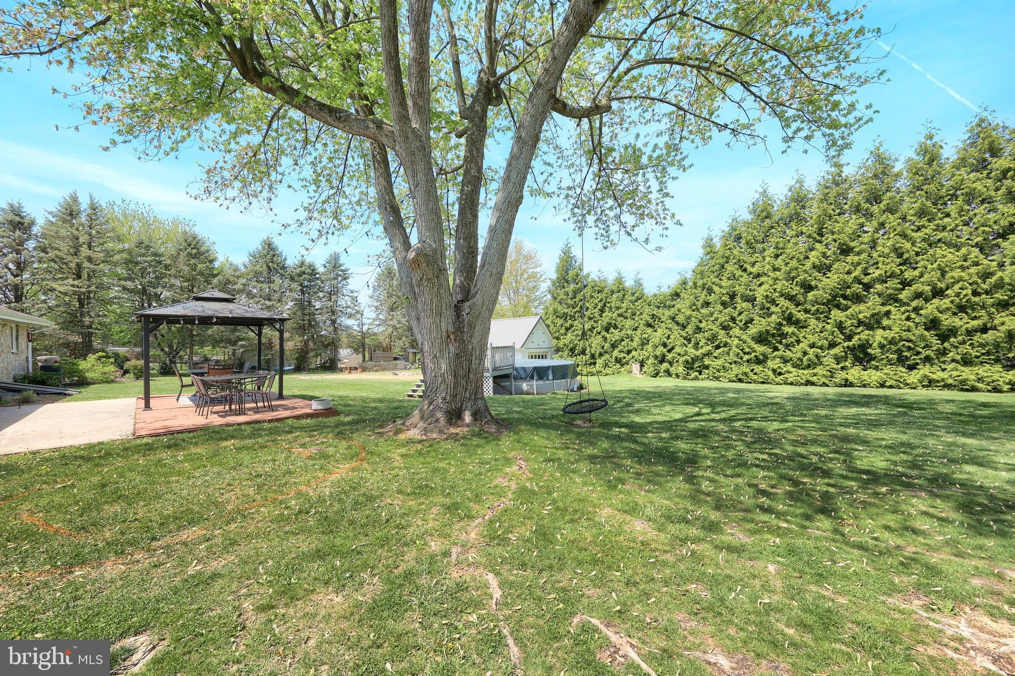 492 Bollinger Road Littlestown, PA 17340 - Photo 36 of 47 a view of backyard with a table and chairs