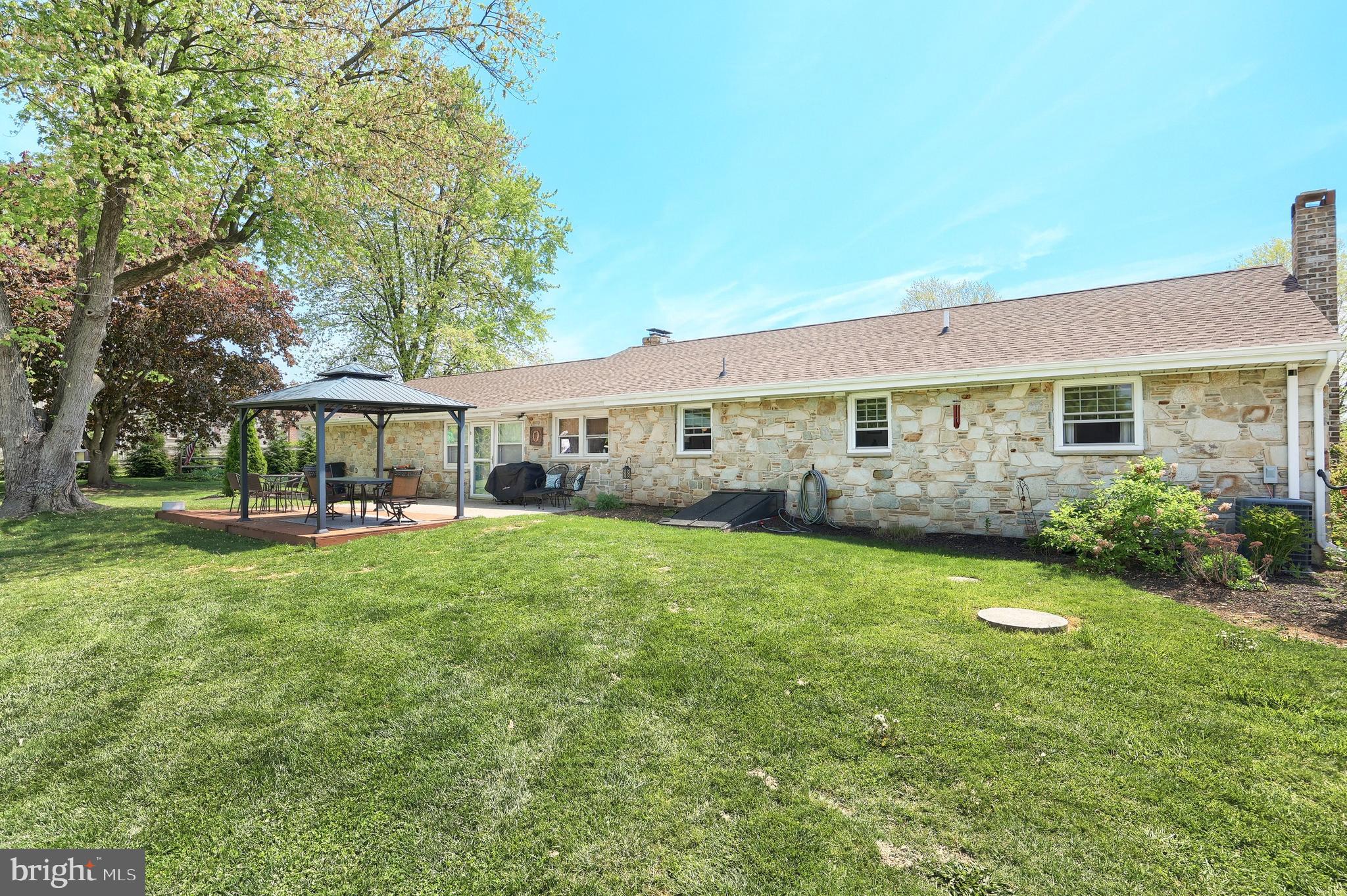 492 Bollinger Road Littlestown, PA 17340 - Photo 39 of 47 a front view of house with yard and outdoor seating