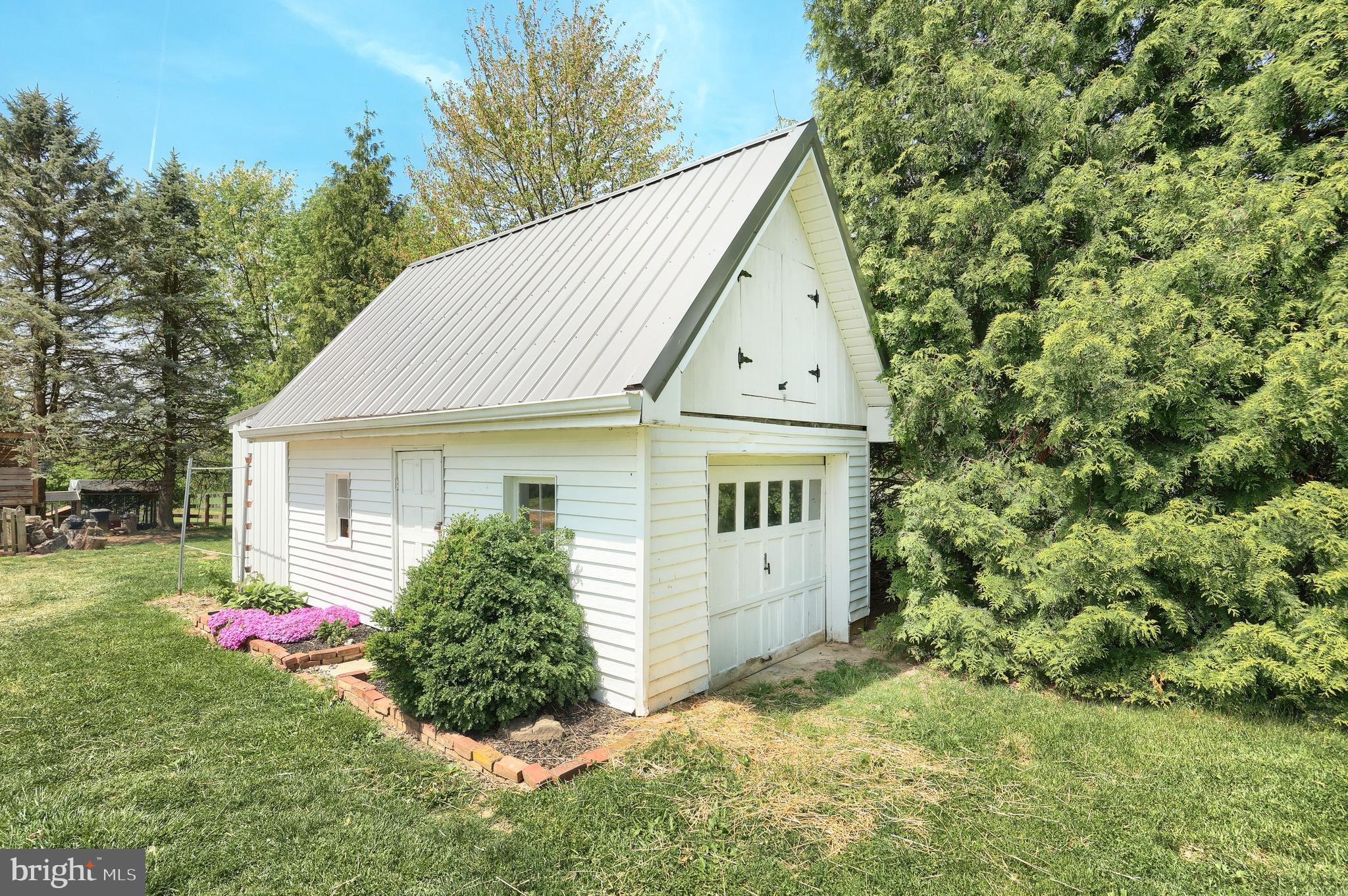 492 Bollinger Road Littlestown, PA 17340 - Photo 40 of 47 a view of a house with yard and garden