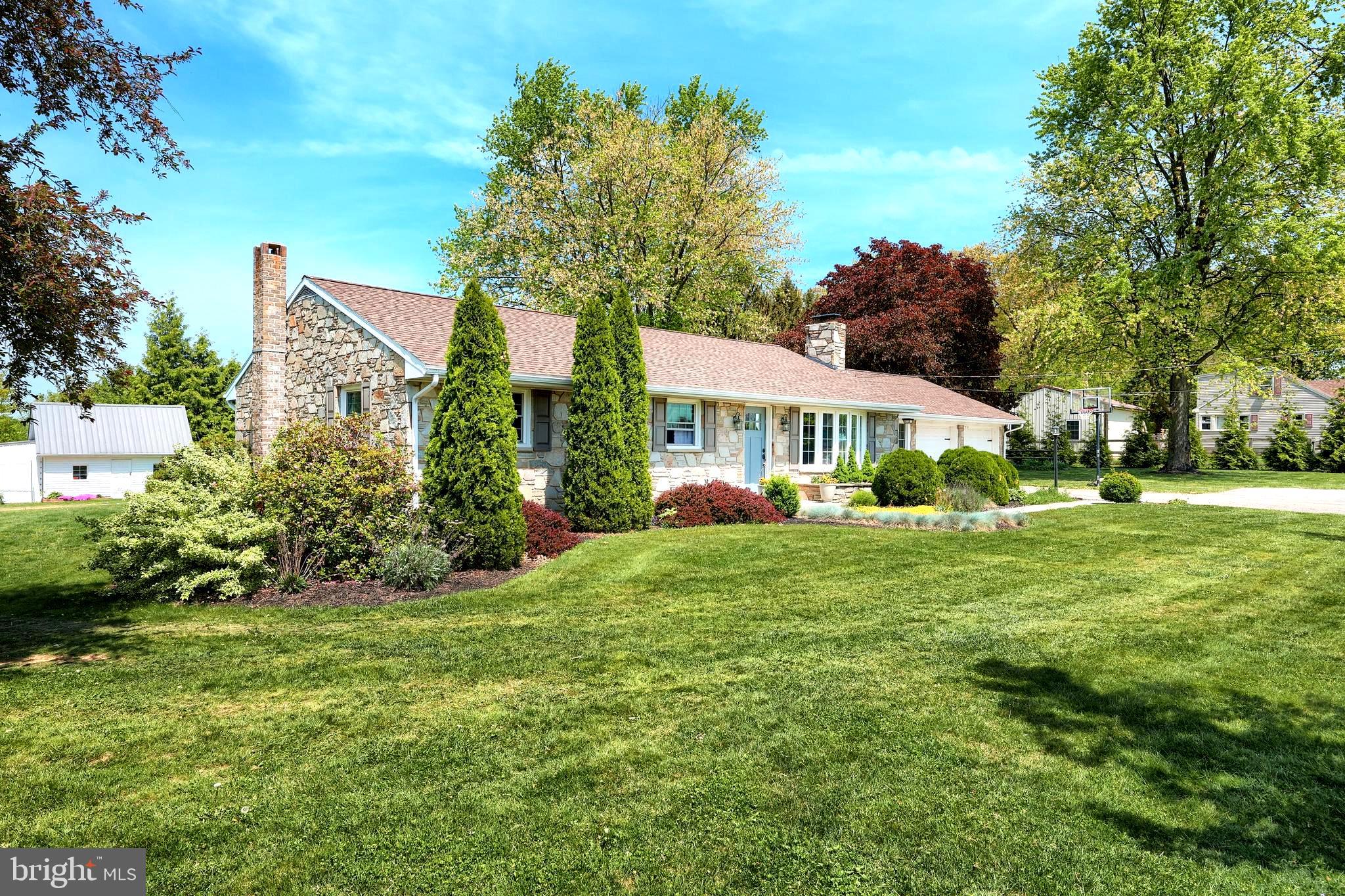 492 Bollinger Road Littlestown, PA 17340 - Photo 4 of 47 a front view of a house with a yard