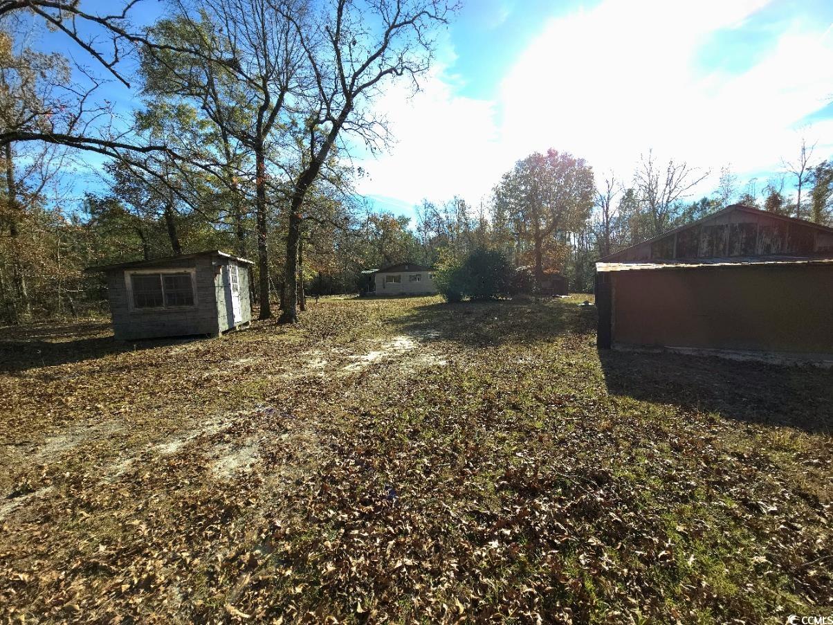 150 Landmark Road Conway, SC 29527 - Photo 27 of 35 View of yard featuring an outbuilding