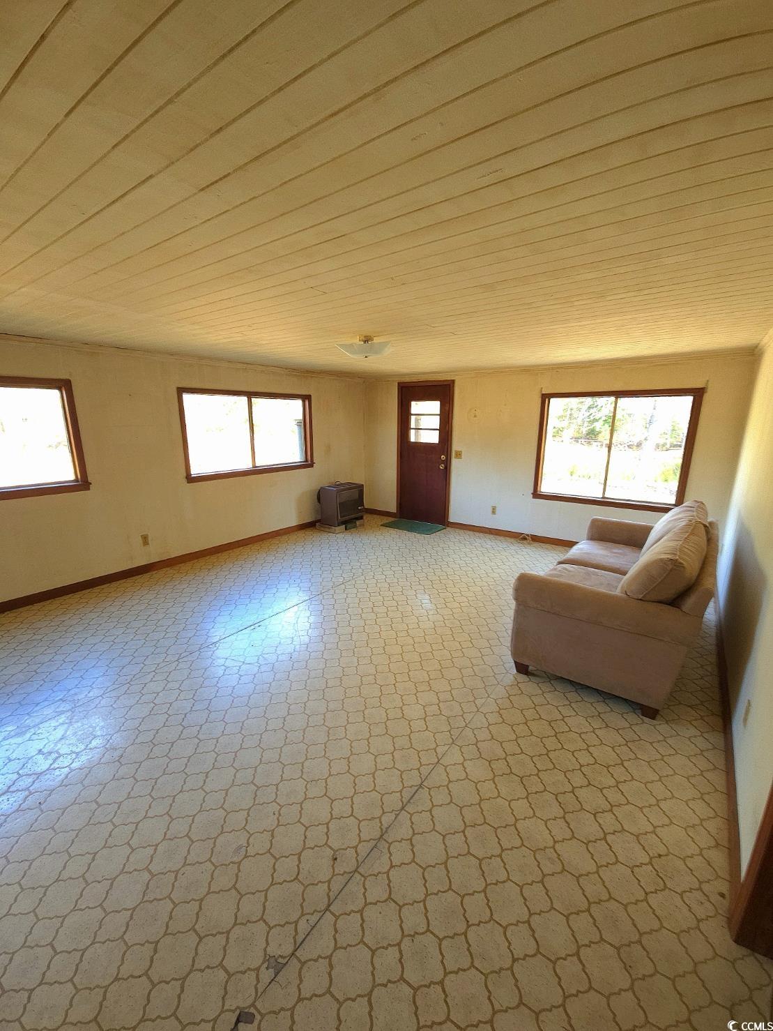 150 Landmark Road Conway, SC 29527 - Photo 4 of 35 Living area featuring plenty of natural light and light flooring