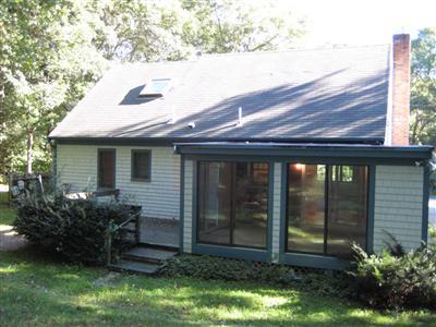 136 Ebenezer Road Osterville, MA 02655 - Photo 2 of 10 a view of a house with backyard and garden