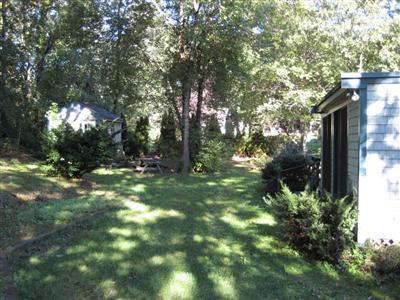 136 Ebenezer Road Osterville, MA 02655 - Photo 7 of 10 a view of backyard with green space