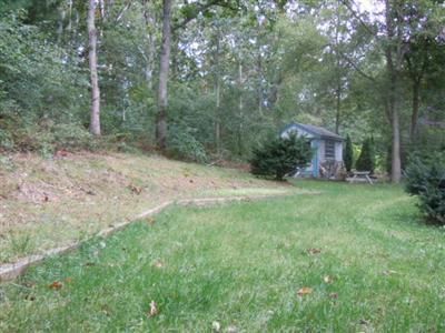 136 Ebenezer Road Osterville, MA 02655 - Photo 10 of 10 a view of a big yard with plants and large trees