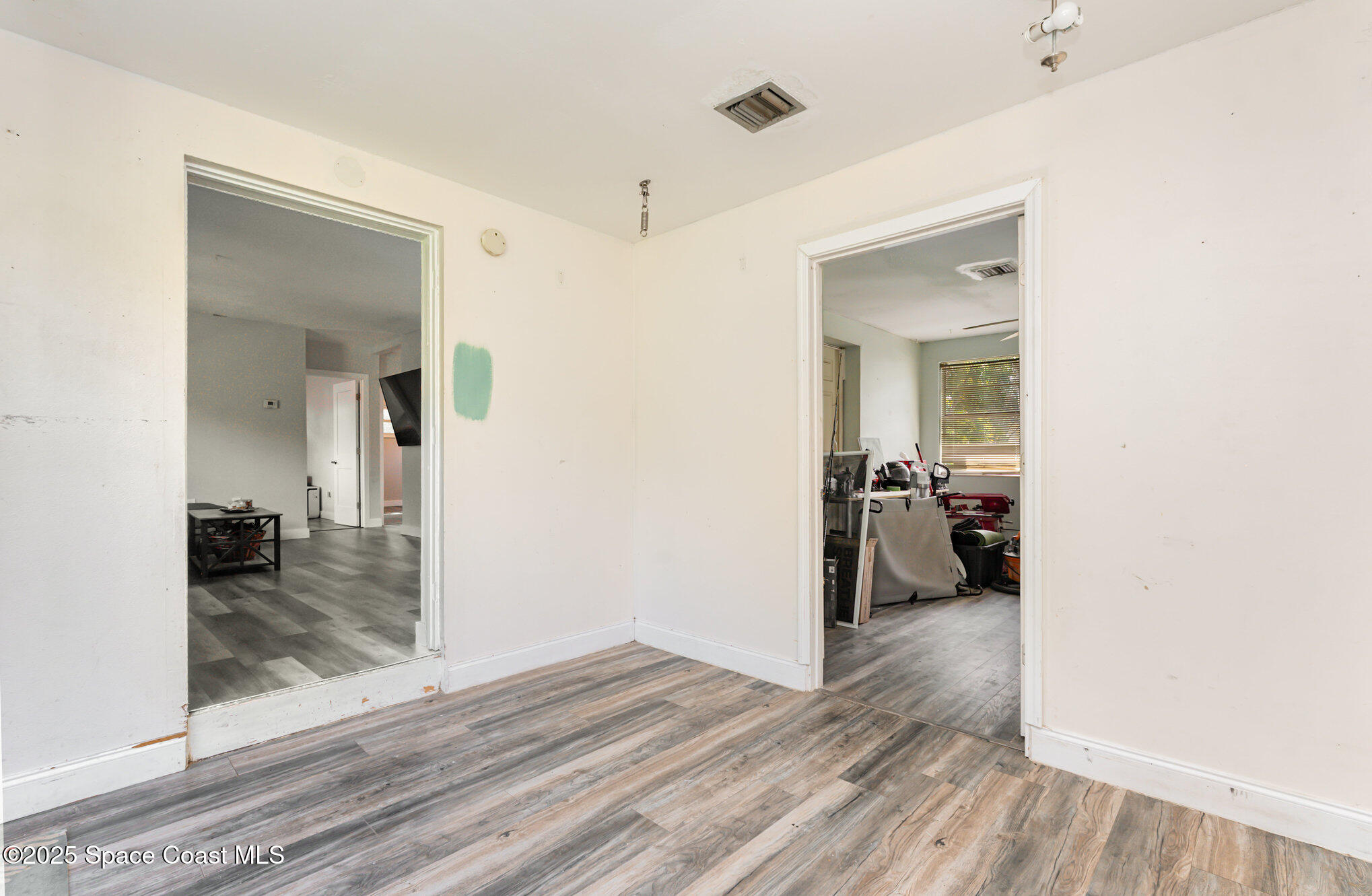 1137 Delmar Terrace Palm Bay, FL 32905 - Photo 19 of 35 a en suite bathroom with a sink and a mirror