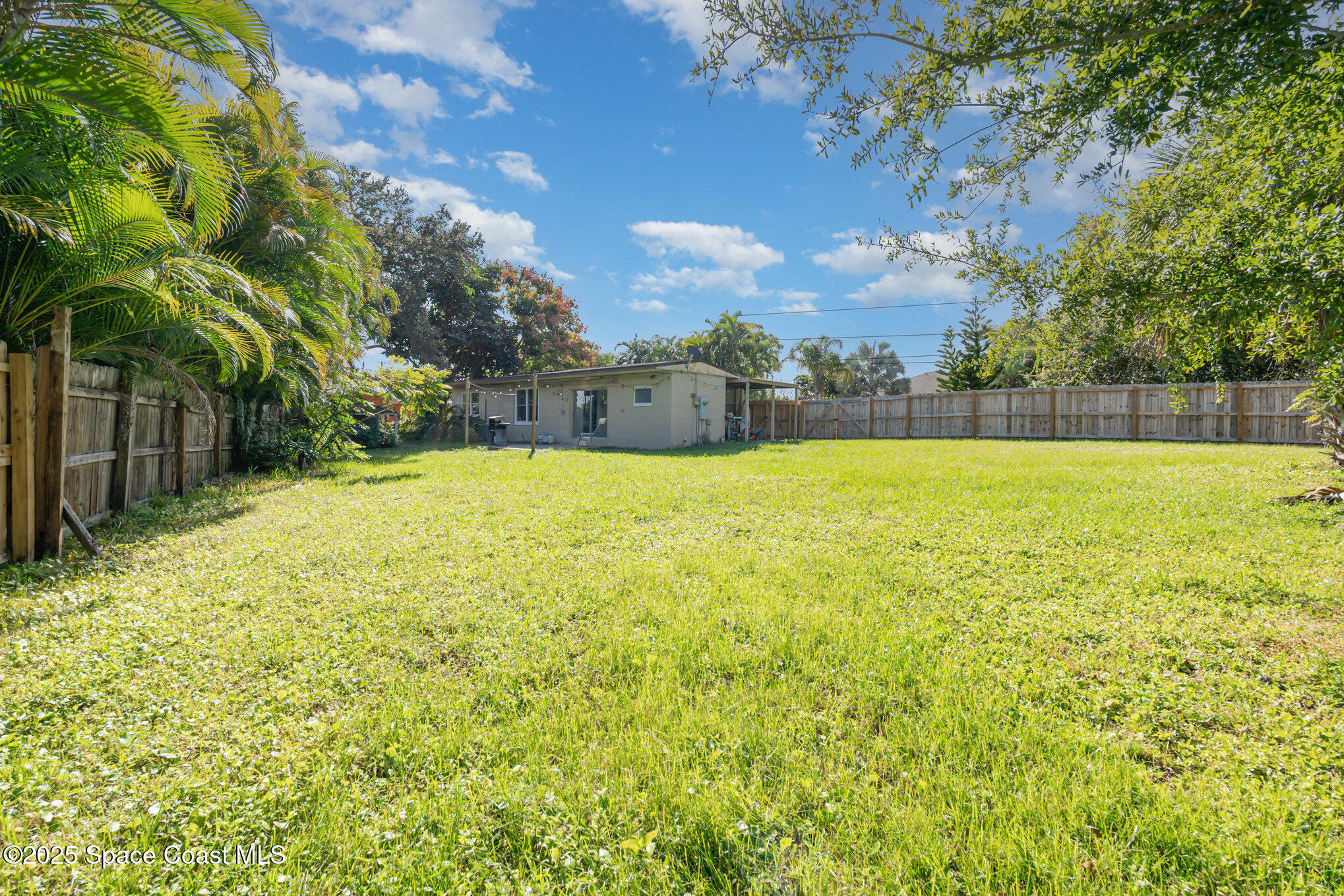 1137 Delmar Terrace Palm Bay, FL 32905 - Photo 3 of 35 a view of an outdoor space and a yard