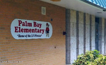 1137 Delmar Terrace Palm Bay, FL 32905 - Photo 32 of 35 a sign on the wall