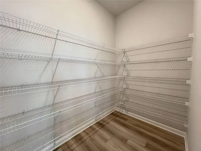 a bathroom with a shower and a bath tub