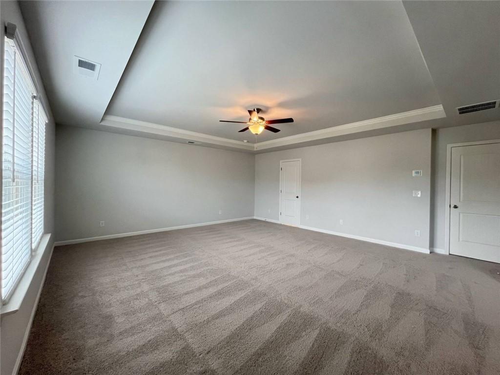 2790 Dolce Road Dacula, GA 30019 - Photo 43 of 66 a view of an empty room with a window