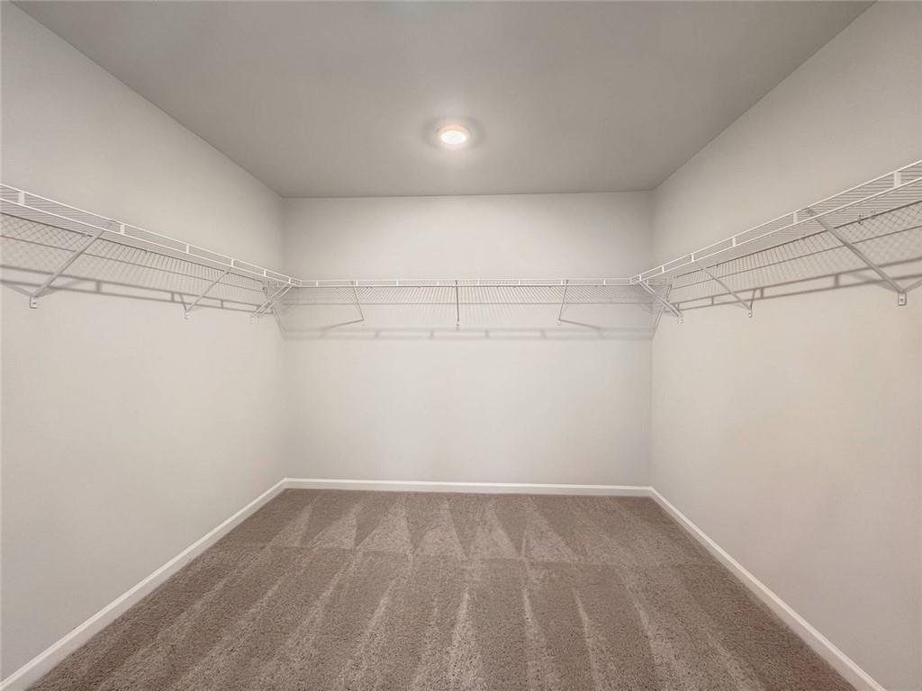 2790 Dolce Road Dacula, GA 30019 - Photo 53 of 66 a view of a room with empty racks