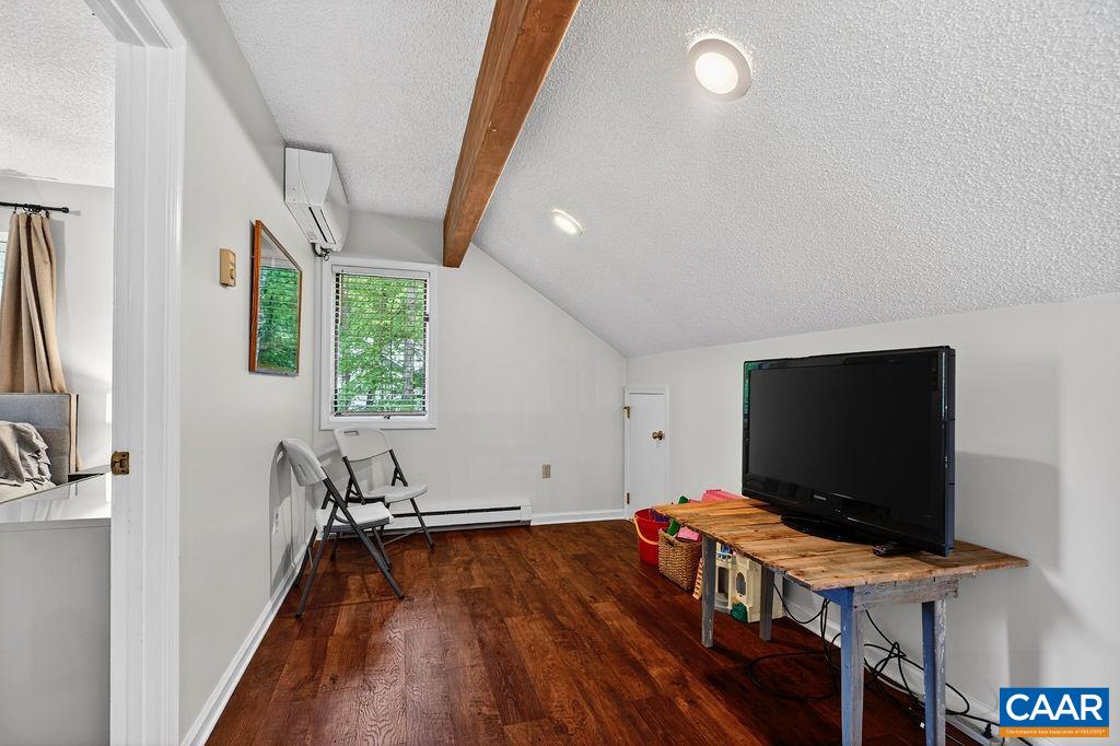 20 Blue Ridge Court Roseland, VA 22967 - Photo 40 of 56 A cozy loft offers flexible space for a home office, game room, reading nook, or simply a quiet place to relax and unwind.