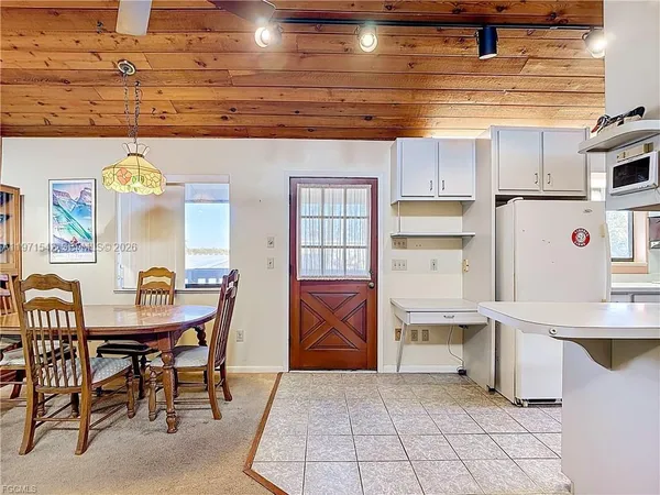 a kitchen with stainless steel appliances granite countertop a stove and a sink