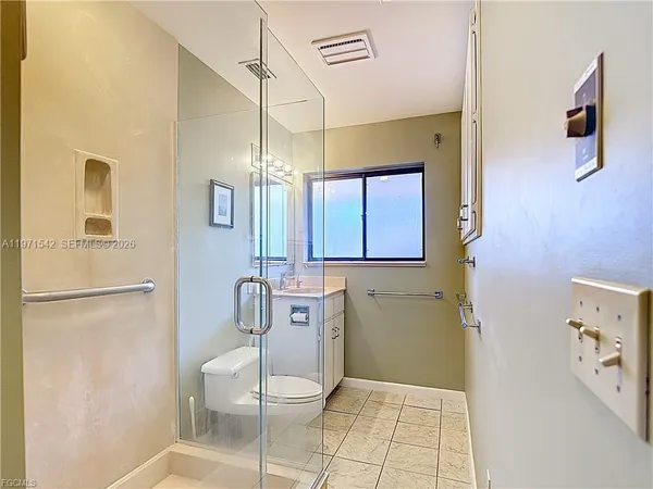 a view of a swimming pool with an outdoor seating and a yard