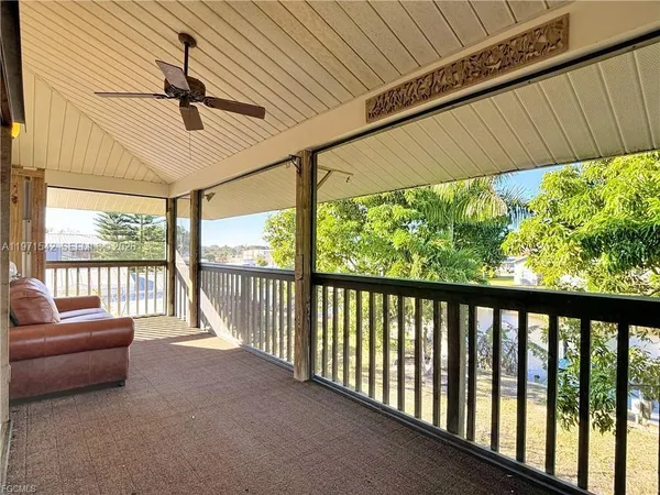 a view of a swimming pool with a lounge chairs