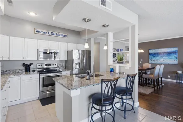 $499,000 | 117 Evergreen Condo Drive, Unit 1B, Sunrise Beach, MO 65079