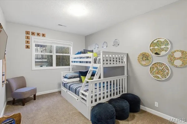 $499,000 | 117 Evergreen Condo Drive, Unit 1B, Sunrise Beach, MO 65079