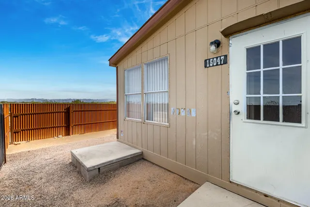 a balcony with a bench