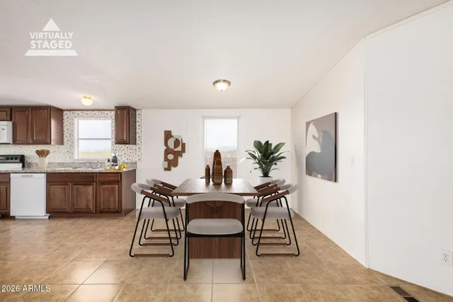 a view of a dining room with furniture