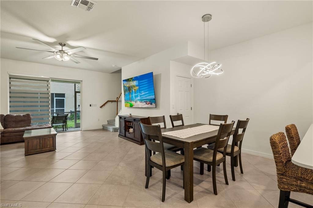 2934 Citrus Street Naples, FL 34120 - Photo 10 of 29 a view of a dining room with furniture