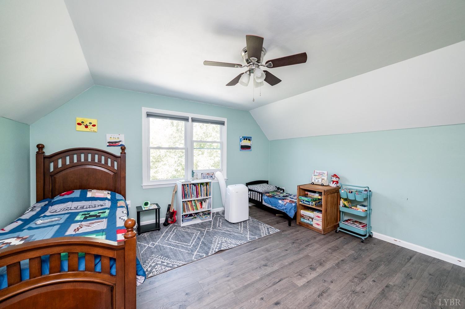 7996 Rocky Ford Road Moneta, VA 24121 - Photo 18 of 45 a bedroom with furniture and a window