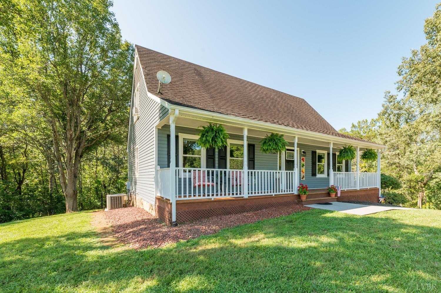 7996 Rocky Ford Road Moneta, VA 24121 - Photo 28 of 45 a view of a house with backyard and porch