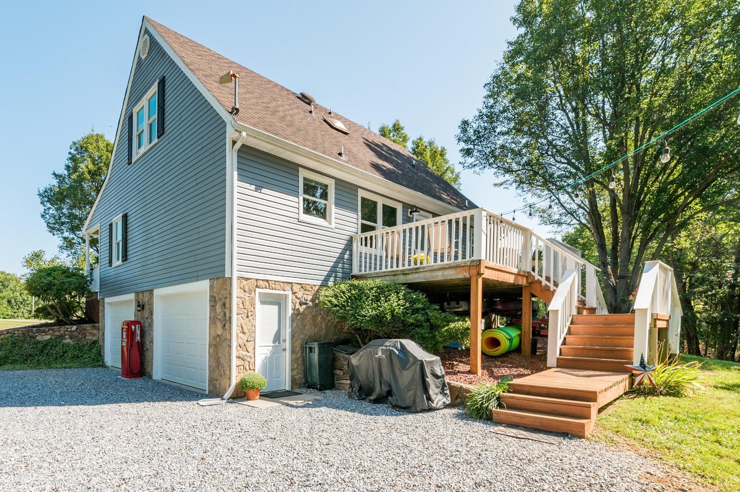 7996 Rocky Ford Road Moneta, VA 24121 - Photo 35 of 45 a front view of a house with garden
