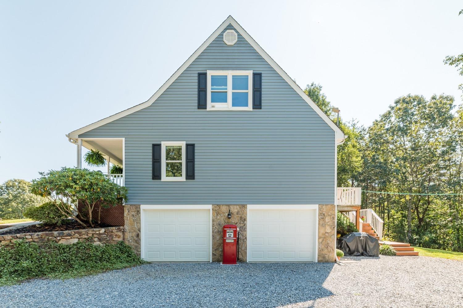 7996 Rocky Ford Road Moneta, VA 24121 - Photo 36 of 45 a view of a house with a yard and plants
