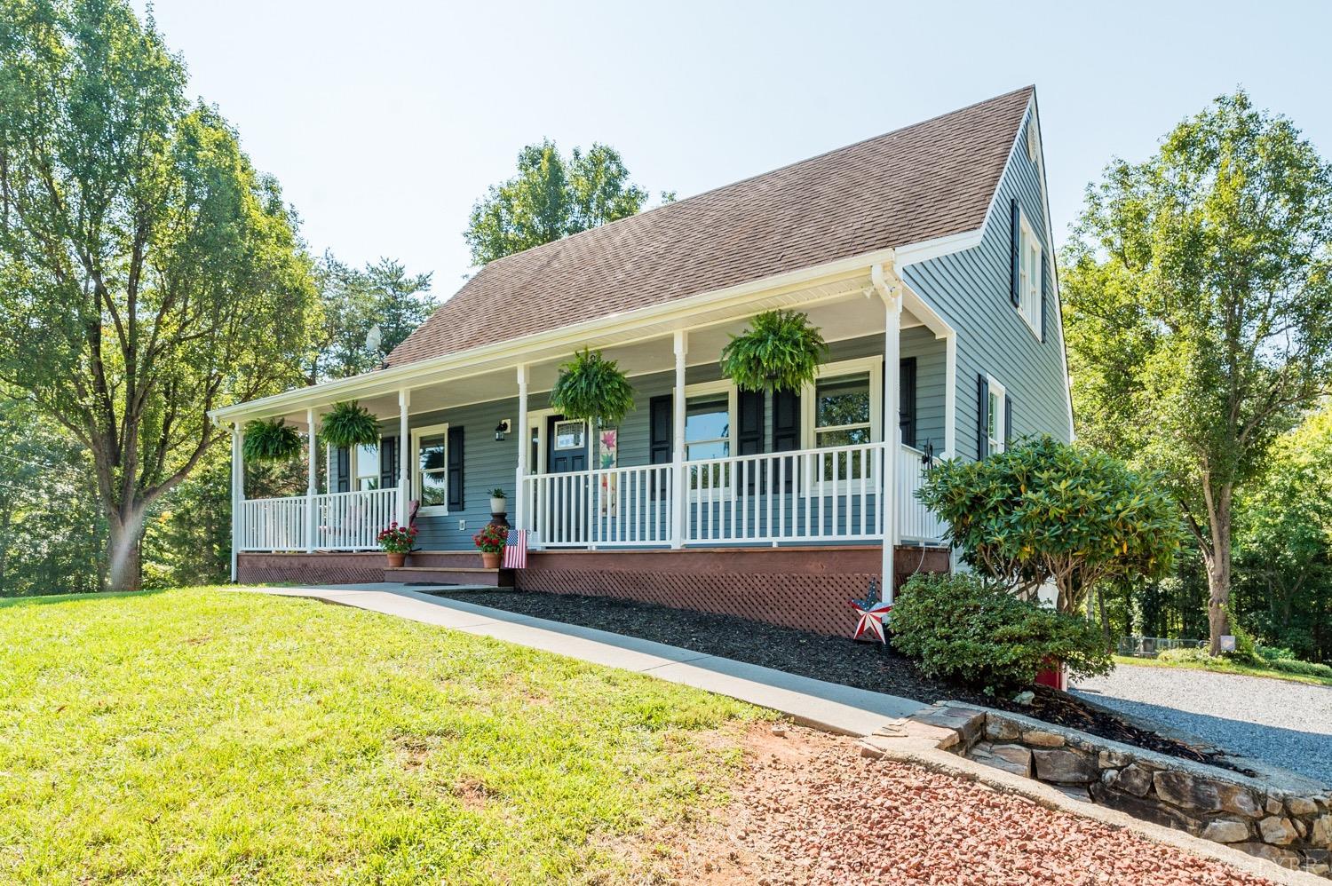 7996 Rocky Ford Road Moneta, VA 24121 - Photo 38 of 45 a view of a house with pool and garden