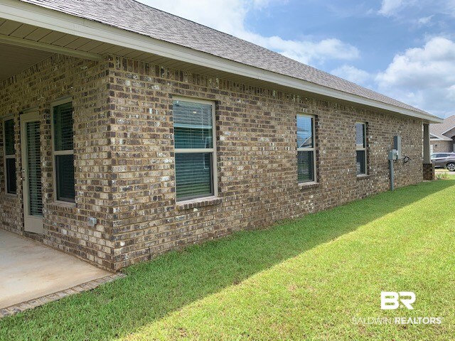 9304 Sitka Drive, Unit 90 Foley, AL 36535 - Photo 18 of 21 Side of home