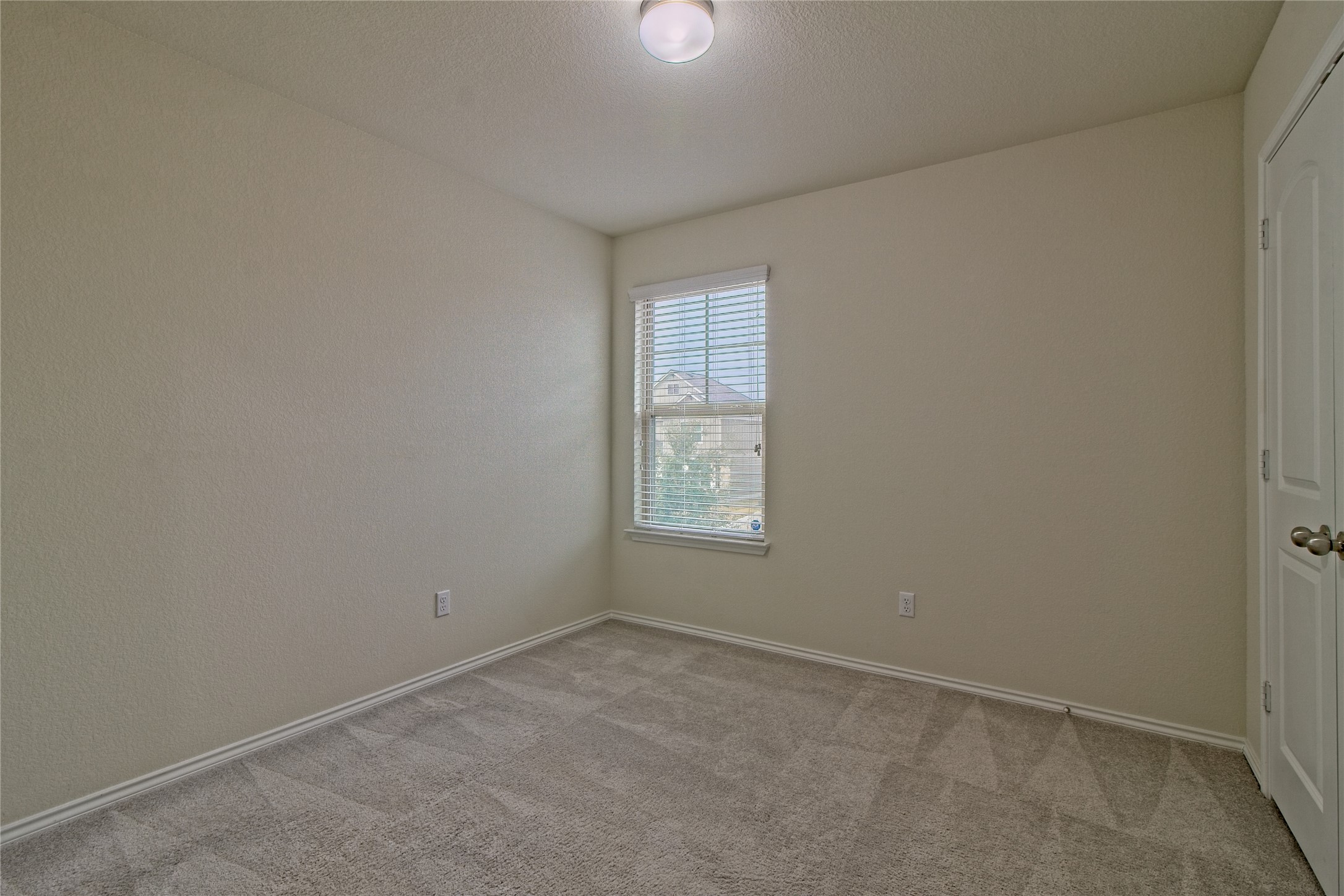 521 Staton Street Georgetown, TX 78626 - Photo 28 of 39 an empty room with a window
