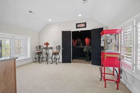 a view of a chairs and table in a patio