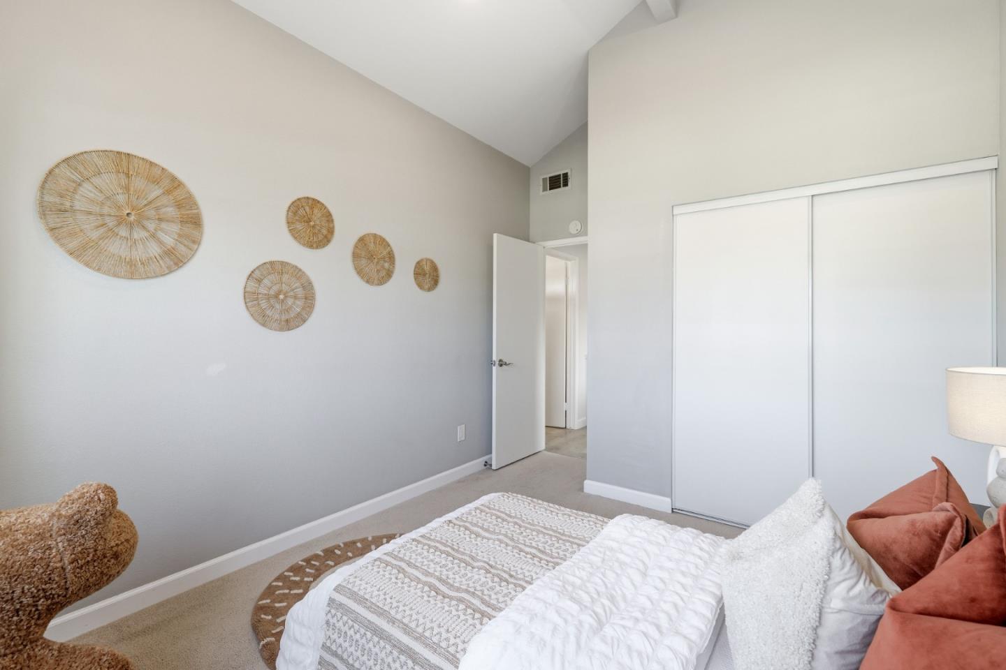 2896 Barrington Terrace Fremont, CA 94536 - Photo 28 of 64 a bedroom with a bed and a lamp