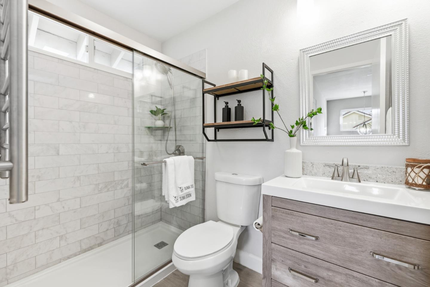 2896 Barrington Terrace Fremont, CA 94536 - Photo 43 of 64 a bathroom with a sink a toilet and shower