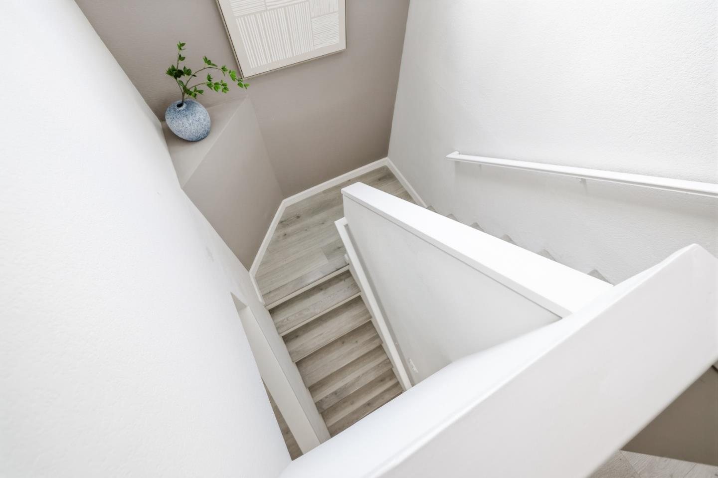 2896 Barrington Terrace Fremont, CA 94536 - Photo 49 of 64 a view of staircase with wooden floor
