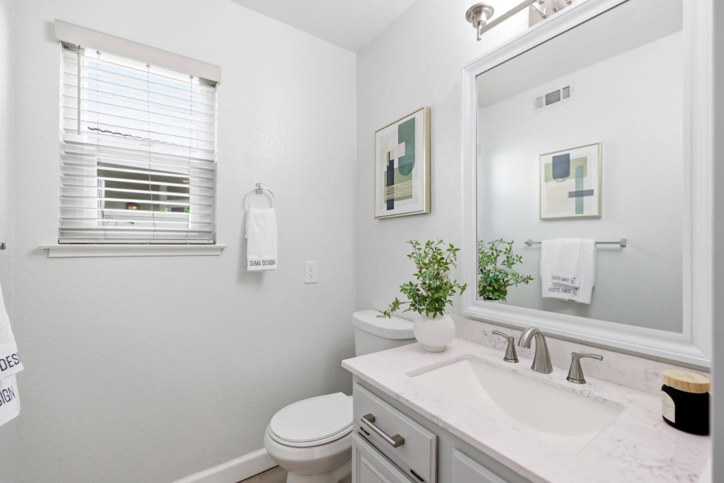 2896 Barrington Terrace Fremont, CA 94536 - Photo 51 of 64 a bathroom with a sink toilet and vanity